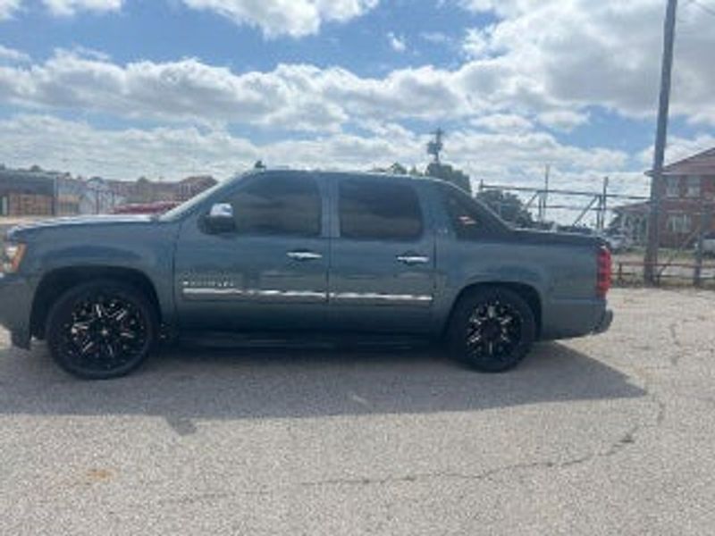 2011 Chevrolet Avalanche — a typically priced live listing