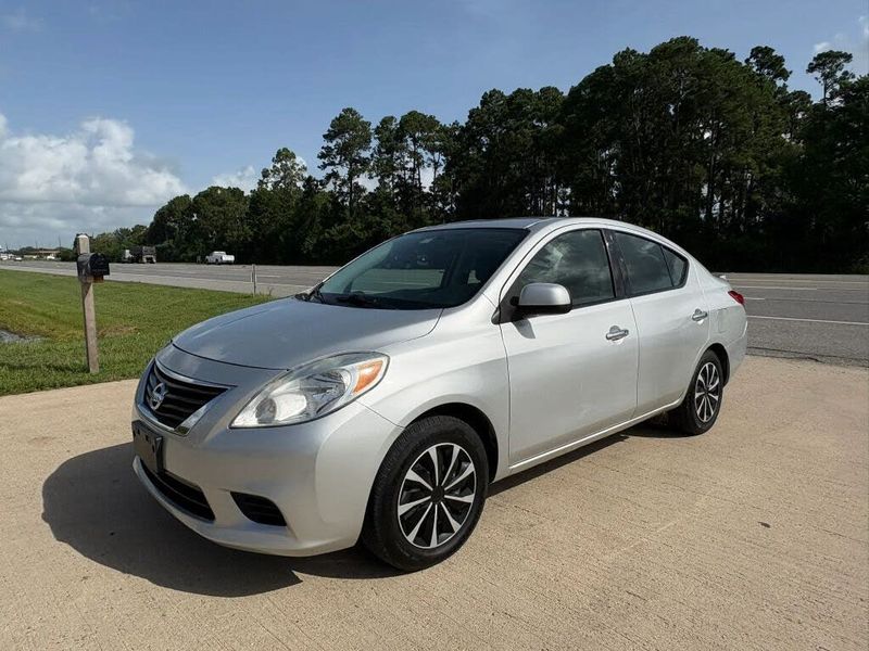 2014 Nissan Versa — a typically priced live listing