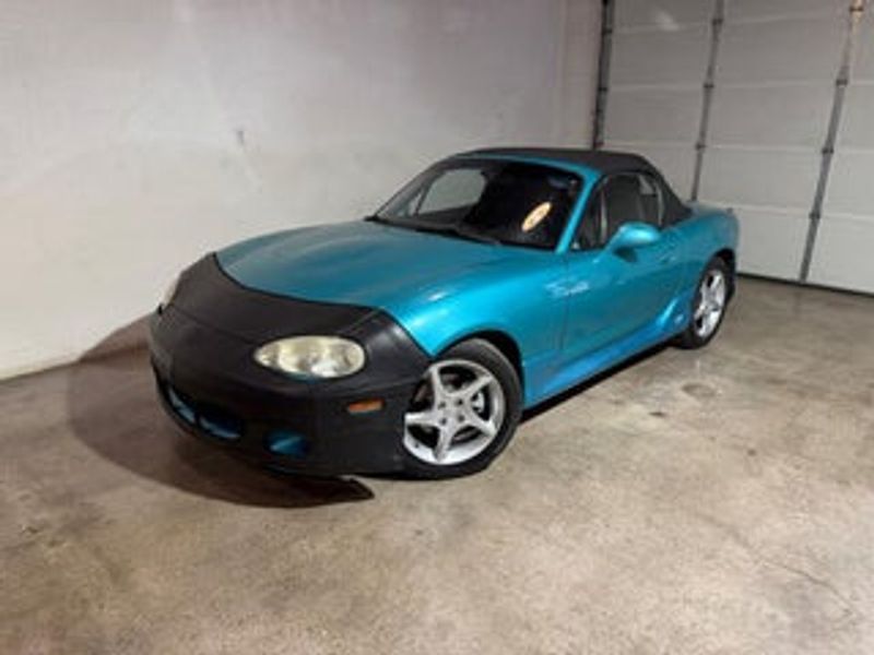 2003 Mazda MX-5 — a typically priced live listing