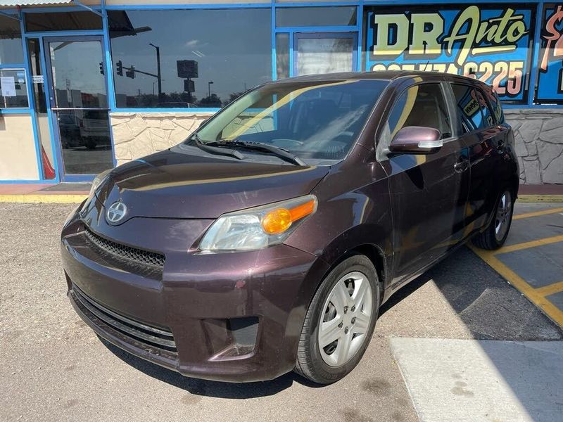 2014 Toyota Scion XD — a typically priced live listing