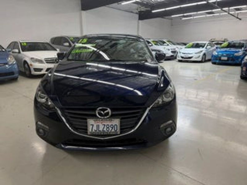 2015 Mazda MAZDA3 — a typically priced live listing