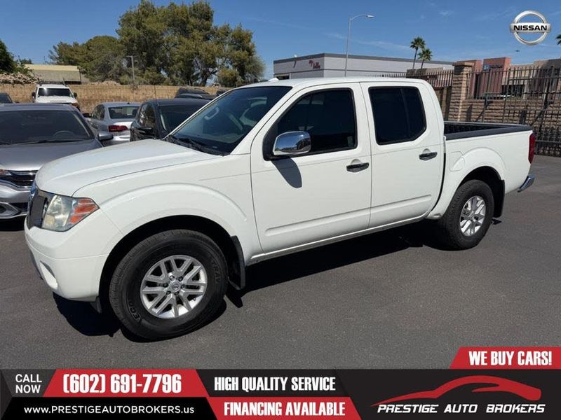 2015 Nissan Frontier — a typically priced live listing