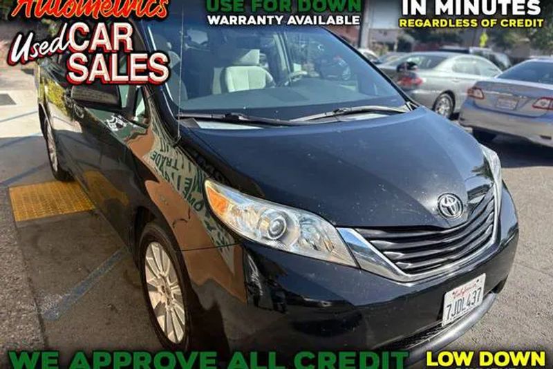 2014 Toyota Sienna — a typically priced live listing